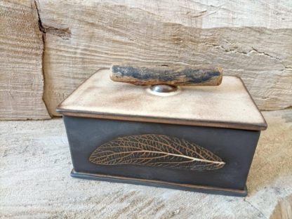 Photo of Multi purpose ceramic container with wooden handle in rectangular shape in black color