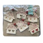 Photo of set of houses decoration which contains 6 pieces of ornaments.