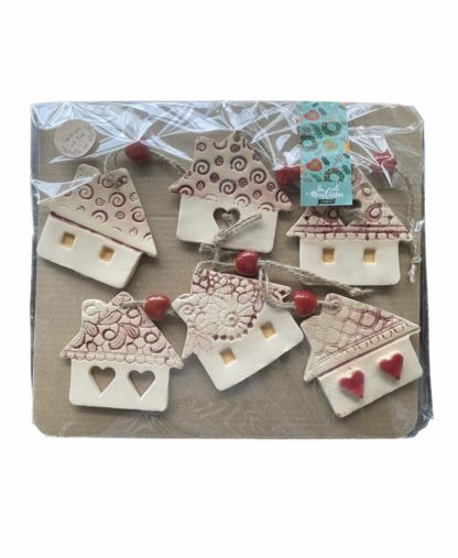 Photo of set of houses decoration which contains 6 pieces of ornaments.